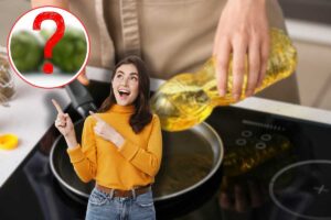 donna che mette olio in padella per friggere, carciofi sfocati e donna sorpresa